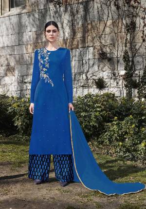Add This Pretty Designer Straight Cut Suit In Royal Blue Colored Top Paired With Black And Royal Blue Bottom And Royal Blue Colored Dupatta. Its Top And Dupatta Are Georgette Based Paired With Santoon Bottom. 