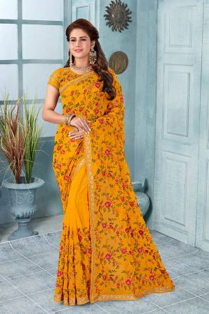 Here Is An Attractive Looking Heavy Designer Saree In Musturd Yellow Color Paired With Black Colored Blouse. This Saree And Blouse Are Fabricated On Georgette Beautified With Coloful Resham Embroidery With Jari & Stone Work, Buy Now.