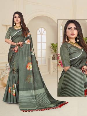 Here Is A Very Pretty Digital Printed Saree In Teal Grey Color. This Beautiful Saree And Blouse Are Fabricated On Art Silk Beautified With Floral Prints. This Saree Is Light Weight And Easy To Carry All Day Long.