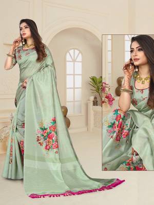Here Is A Very Pretty Digital Printed Saree In Light Pastel Green Color. This Beautiful Saree And Blouse Are Fabricated On Art Silk Beautified With Floral Prints. This Saree Is Light Weight And Easy To Carry All Day Long.