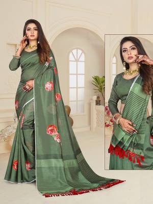 Here Is A Very Pretty Digital Printed Saree In Green Color. This Beautiful Saree And Blouse Are Fabricated On Art Silk Beautified With Floral Prints. This Saree Is Light Weight And Easy To Carry All Day Long.