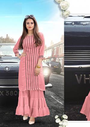 Look Pretty In This Lovely Readymade Kurti In Pink Color Paired With Pink  Colored Bottom. This Kurti And Bottom Are Fabricated On Georgette Which IS Light Weight And Easy To Carry All Day Long. 