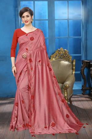 Grab This Pretty Attractive Looking Designer Saree In Pink Color Paired With Red Colored Blouse. This Saree Is Fabricated On Soft Silk Paired With Art Silk Fabricated Blouse. It Is Beautified With Velvet Patch Work And Stone Work. Buy Now.