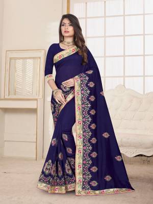 Here Is An Attractive Looking Heavy Designer Saree In Navy Blue Color Paired With Navy Blue Colored Blouse. This Saree And Blouse Are Fabricated On Art Silk Beautified With Coloful Resham Embroidery With Jari & Coding Work, Buy Now.