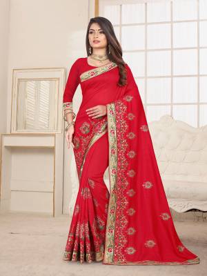 Here Is An Attractive Looking Heavy Designer Saree In Red Color Paired With Red Colored Blouse. This Saree And Blouse Are Fabricated On Art Silk Beautified With Coloful Resham Embroidery With Jari & Coding Work, Buy Now.