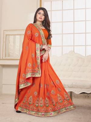 Here Is An Attractive Looking Heavy Designer Saree In Orange Color Paired With Orange Colored Blouse. This Saree And Blouse Are Fabricated On Art Silk Beautified With Coloful Resham Embroidery With Jari & Coding Work, Buy Now.