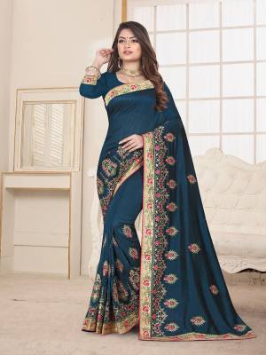 Here Is An Attractive Looking Heavy Designer Saree In Teal Blue Color Paired With Teal Blue Colored Blouse. This Saree And Blouse Are Fabricated On Art Silk Beautified With Coloful Resham Embroidery With Jari & Coding Work, Buy Now.