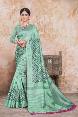Here Is A Very Pretty Digital Printed Saree In Sea Green Color. This Beautiful Saree And Blouse Are Fabricated On Art Silk Beautified With Floral Prints. This Saree Is Light Weight And Easy To Carry All Day Long.