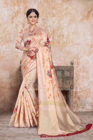 Here Is A Very Pretty Digital Printed Saree In Beige Color. This Beautiful Saree And Blouse Are Fabricated On Art Silk Beautified With Floral Prints. This Saree Is Light Weight And Easy To Carry All Day Long.
