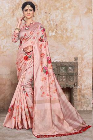 Here Is A Very Pretty Digital Printed Saree In Peach Color. This Beautiful Saree And Blouse Are Fabricated On Art Silk Beautified With Floral Prints. This Saree Is Light Weight And Easy To Carry All Day Long.