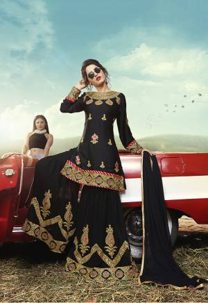 For A Bold And Beautiful Look, Grab This Heavy Deisgner Sharara Suit In All Over In Black Color. Its Top Is Satin Based Paired With Georgette Bottom and Dupatta. Its Top And Bottom Are Beautified With Heavy Embroidery Giving An Attractive Look.