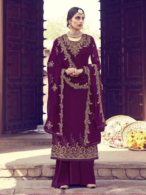 Catch All The Limelight Wearing This Heavy Designer Suit In All Over In Wine Color. Its Heavy Embroidered Top And Dupatta Are Fabricated On Georgette Paired With Santoon Fabricated Bottom. It Is Beautified With Detailed Jari And Resham Embroidery With Stone Work. 