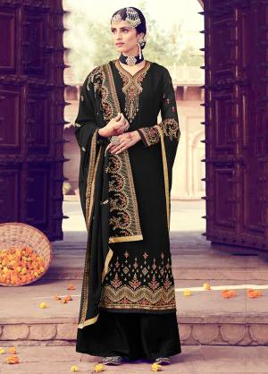 Catch All The Limelight Wearing This Heavy Designer Suit In All Over In Black Color. Its Heavy Embroidered Top And Dupatta Are Fabricated On Georgette Paired With Santoon Fabricated Bottom. It Is Beautified With Detailed Jari And Resham Embroidery With Stone Work. 