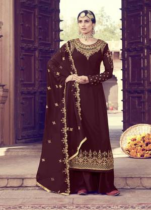 Royal And Elegant Looking Shade Is Here To Add Into Your Wardrobe With This Heavy Designer Straight Suit In Maroon Color. Its Top And Dupatta Are Fabricated on Georgette Beautified With Heavy Embroidery Paired With Santoon Bottom. 