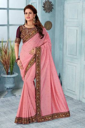 Grab This Heavy Embroidered Saree In Pink Color. This Saree?And Blouse Are Silk Based Beautified With Multi Colored Kashmiri Embroidery. This Pretty Saree Gives A Rich Look And It Is Suitable For Wedding And Festive Season. Buy Now.