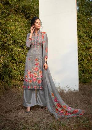 Celebrate This Festive With Beauty and Comfort By Wearing This Light Weight Designer Suit In Grey Color. Its Top Is Georgette Based Paired With Santoon Bottom and Chiffon Fabricated dupatta. Its Pretty Attractive Top And Dupatta are Beautified With Tone To Tone Embroidery and Floral Digital Prints. 