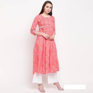 Here Is A Designer Readymade A-Line Patterned Kurti In Pink Color. It Is Fabricated On Cotton Beautified With Prints And Hand Work. It Is Light In Weight And Can Be Paired With Same Of Contrasting Colored Bottom. 