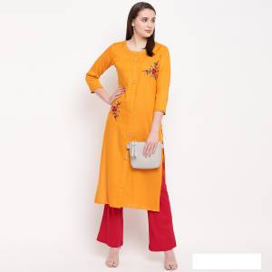 For Your Semi-Casual Wear, Grab This Readymade Straight Cut Kurti In Musturd Yellow Color Fabricated On Rayon. It Is Beautified With Simple Resham Embroidery And Available In All Sizes. Buy Now.