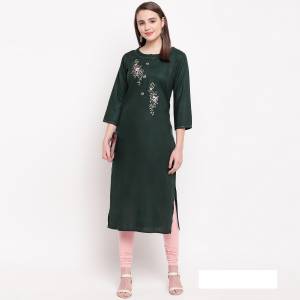 For Your Semi-Casual Wear, Grab This Readymade Straight Cut Kurti In Pine Green Color Fabricated On Rayon. It Is Beautified With Simple Resham Embroidery And Available In All Sizes. Buy Now.