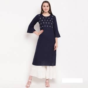 Celebrate This Festive Season With Beauty And Comfort Wearing This Designer Readymade Straight Kurti In Navy Blue Color Fabricated On Rayon. It Is Beautified With Elegant Hand Work Which Will Earn You Lots Of Compliments From Onlookers. Pair It Up With A White Colored Bottom And Dupatta To Complete The Look. 