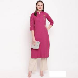 Add This Pretty And Elegant Looking Readymade Straight Kurti In Dark Pink Color Fabricated On Rayon. It Is Beautified With Hand Work. It Is Light Weight And Easy To Carry All Day Long.