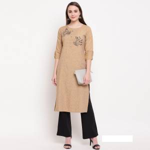 Flaunt Your Rich And Elegant Taste Wearing This Designer Readymade Straight Kurti In Beige. This Kurti Is Rayon Based Beautified With Hand Work. Buy Now.