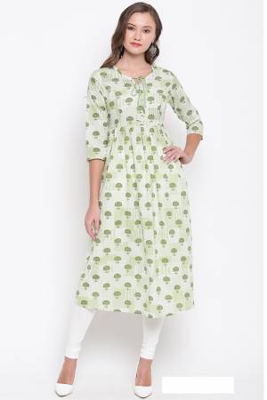 Simple And Elegant Looking Readymade Kurti Is Here In Light Green And White Color Fabricated On Cotton. It Is Light Weight And Suitable For Your Casual Wear.