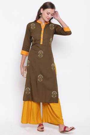 Grab This Beautiful Kurti In Dark Olive Green Color Fabricated On Rayon. This Readymade Straight Kurti IS Light Weight And Can Be Paired With Same Or Contrasting Colored Bottom. 