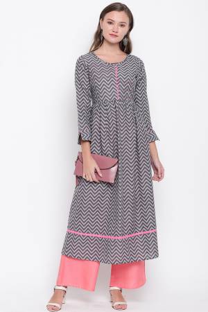 Add Some Casuals With This Pretty Kurti In Grey Color Fabricated On Cotton. This Readymade Kurti Is Soft Towards Skin And Easy To Carry all Day Long. Buy Now.