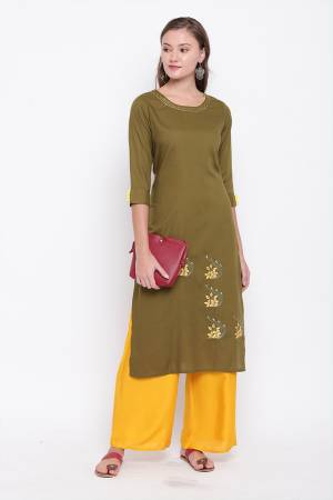 Add Some Casuals With This Pretty Kurti In Olive Green Color Fabricated On Rayon. This Readymade Kurti Is Soft Towards Skin And Easy To Carry all Day Long. Buy Now.