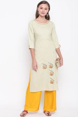 Grab This Beautiful Kurti In Cream Color Fabricated On Rayon. This Readymade Straight Kurti IS Light Weight And Can Be Paired With Same Or Contrasting Colored Bottom. 