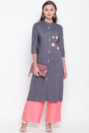 Here Is A Pretty Elegant Looking Readymade Straight Kurti Is Here In Grey Color Fabricated On Rayon. This Pretty Kurti IS Suitable For Your Casual Or Semi-Casual Wear. 