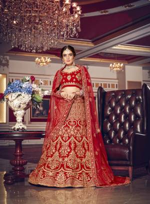 Look Pretty In This Every Girl's Favourite Color For Bridal Wear In?All Over Red Colored Lehenga Choli. This Very Beautiful Heavy Designer Lehenga Choli Is Fabricated on Velvet Paired With Net Fabricated Dupatta. Buy Now. Its Attractive Embroidery And Color Will Definitlely Earn You Lots Of Compliments From Onlookers. 
