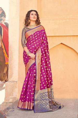 Classy Saree look pretty like never before.Wearing this Magenta Pink Color Saree which made from Handloom Silk With Blue & Golden Color Handloom Silk blouse, Saree has also decorative work like Heavy Jacquard Work With Pallu.This beautiful Saree features a classy Jacquard Work all over,which makes it a smart pick for all occasions. You can wear this Saree in different styles.