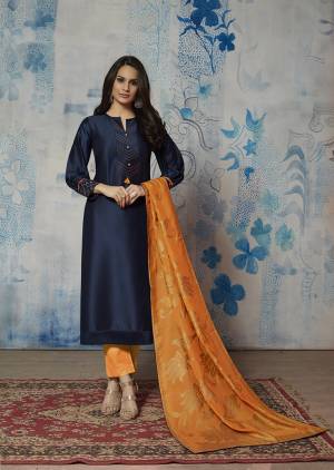 Enhance Your Personality Wearing This Designer Readymade Kurti In Navy Blue Color Paired With Contrasting Orange Colored Dupatta. Its Top Is Fabricated on Muslin Beautified With Hand Work Paired With Jacquard Silk Fabricated Dupatta. 