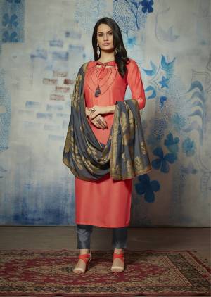 Enhance Your Personality Wearing This Designer Readymade Kurti In Peach Orange Color Paired With Contrasting Dark Grey Colored Dupatta. Its Top Is Fabricated on Muslin Beautified With Hand Work Paired With Jacquard Silk Fabricated Dupatta. 