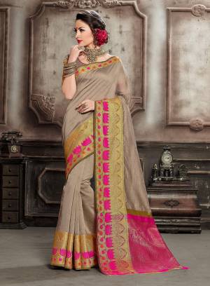 Celebrate This Festive Season With Beauty And Comfort Wearing This Designer Silk Based Saree In Sand Grey Color. This Pretty Saree And Blouse Are Fabricated On Handloom Silk Beautified With Heavy Weaved Lace Border. 