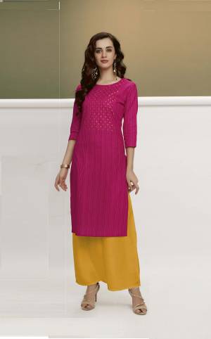 Grab This Beautiful Designer Pair Of Kurti With Plazzo. This Pretty Kurti Is In Dark Pink Color Paired With Yellow Colored Bottom. This Pretty Pair Is Cotton Based Which Is Durable, Light Weight And Easy To Carry All Day Long. 