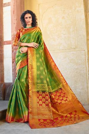 Classy Saree look pretty like never before.Wearing this Green Color Saree which made from Silk With Red Color Silk blouse, Saree has also decorative work like Heavy Jacquard Work With Pallu.This beautiful Saree features a classy Jacquard Work all over,which makes it a smart pick for all occasions.