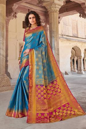 Classy Saree look pretty like never before.Wearing this Blue Color Saree which made from Silk With Magenta Pink Color Silk blouse, Saree has also decorative work like Heavy Jacquard Work With Pallu.This beautiful Saree features a classy Jacquard Work all over,which makes it a smart pick for all occasions.