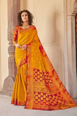 Classy Saree look pretty like never before.Wearing this Musturd Yellow Color Saree which made from Silk With Red Color Silk blouse, Saree has also decorative work like Heavy Jacquard Work With Pallu.This beautiful Saree features a classy Jacquard Work all over,which makes it a smart pick for all occasions.