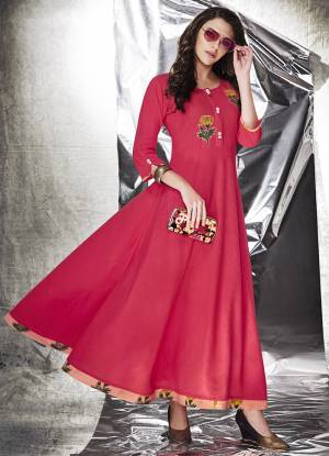 Simple Gown Is Here For Your Semi-Casual Wear In Dark Pink Fabricated On Cotton Slub Beautified With Patch Work. This Gown Is Light In Weight And Available In All Regular Sizes. 