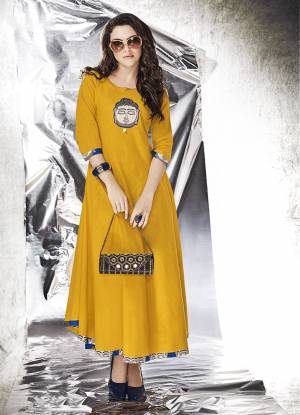 Simple Gown Is Here For Your Semi-Casual Wear In Yellow Fabricated On Cotton Slub Beautified With Patch Work. This Gown Is Light In Weight And Available In All Regular Sizes. 