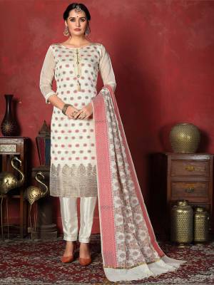 For A Royal Look, Grab This Designer Silk based Dress Material In Off-White Color. Its Top Is Fabricated on Banarasi Silk Paired With Santoon Bottom And Jacquard Silk Fabricated Dupatta. It Is Beautified With Attractive Weave. 