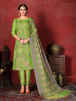 Shine Bright In This Attractive Looking Straight Suit In Parrot Green Color. This Dress Material Is Banarasi Silk Based Paired With Santoon Bottom And Jacquard Silk Fabricated Dupatta. Buy Now.