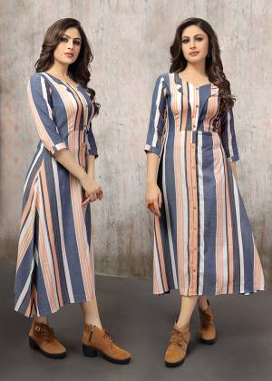 Here Is A Trendy Readymade Kurti In Blue And Peach Color Fabricated On Cotton. It Is Beautified With Lining prints Giving An Elegant Look. Buy This Kurti Now.