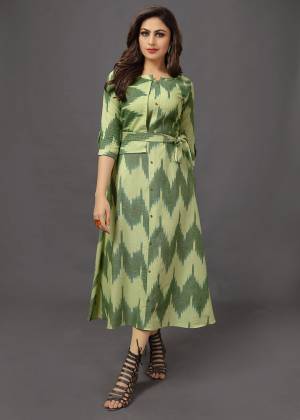 Add This Very pretty Readymade Calf Length Kurti In Green Color. This Trendy Kurti Is Cotton Based. You can Wear It As It Or Also You can Pair This Up With Leggings Or Pants. 