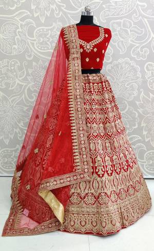 Look Pretty In This Every Girl's Favourite Color For Bridal Wear?In All Over Red Colored Lehenga Choli. This Very Beautiful Heavy Designer Lehenga Choli Is Fabricated on Velvet Paired With Net Fabricated Dupatta. Buy Now. Its Attractive Embroidery And Color Will Definitlely Earn You Lots Of Compliments From Onlookers.