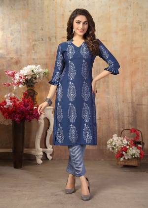 For Your Semi-Casual Wear, Grab This Designer Readymade Set Of Kurti And Pant In Blue Color. This Kurti And Pant Are Fabricated on Cotton Silk Beautified With Prints. It IS Available In All Regular Sizes. 