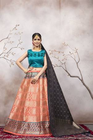 Celebrate This Festive And Wedding Season Wearing This Pretty Designer Lehenga Choli In Blue Colored Blouse Paired With Dark Peach Colored Lehenga And Navy Blue Colored Dupatta. This Silk Based Lehenga Choli Will Give A Rich Look To Your Personality. 